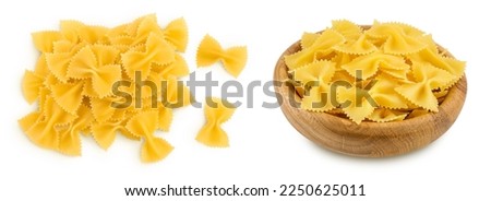 Bow tie pasta isolated on white background with full depth of field. Top view. Flat lay. Royalty-Free Stock Photo #2250625011