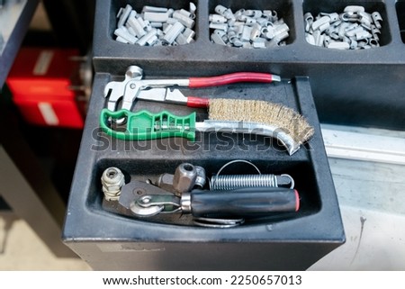 Close up picture of a car mechanic's tools in workshop. Variety of tools for car reparation. Conceptual picture