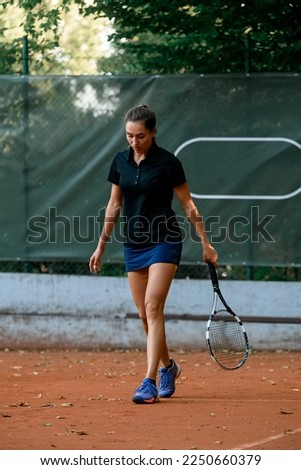 Female tennis player with racket gear in tournament match or fun outdoor hobby activity. Sports, active and fit woman preparing to serve opponent during competitive or training exercise