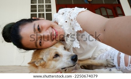 Asian woman selfie with dog,Self portrait