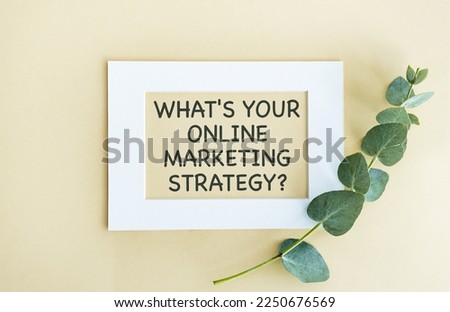 Text What's your marketing strategy on white paper - business concept