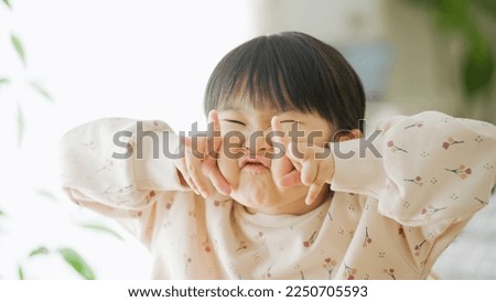 Smiling child in the room