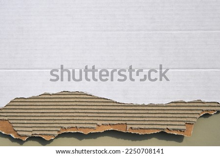 Ripped carboard box texture minimal Royalty-Free Stock Photo #2250708141