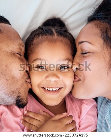 Parents kiss, daughter and smile portrait of a black family together with love, bonding and care. Home, happiness and youth of a kid, mother and father top view cheek kissing a face on a bedroom bed