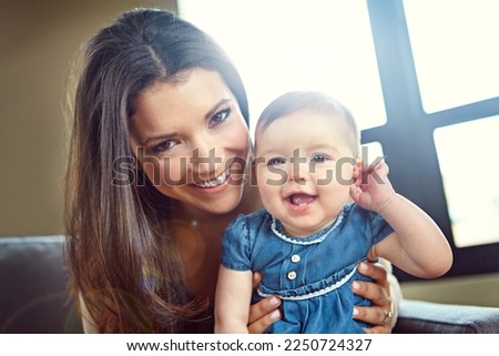 Mom, bonding and baby girl portrait in house living room or family home sofa in support trust, security and love hug. Smile, infant and happy mother holding child for social media and profile picture