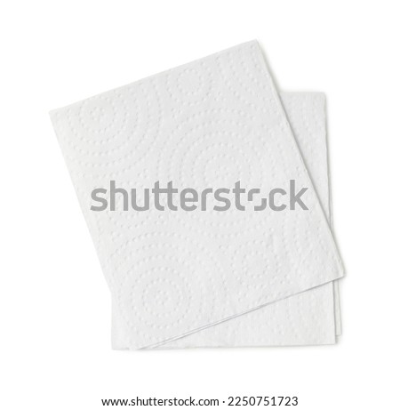 Two folded pieces of white tissue paper or napkin in stack tidily prepared for use in toilet or restroom are isolated on white background with clipping path. Royalty-Free Stock Photo #2250751723