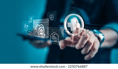Health service innovation and Insurance Concept. Businessman using smartphone with virtual medical health care icons for medical treatment service