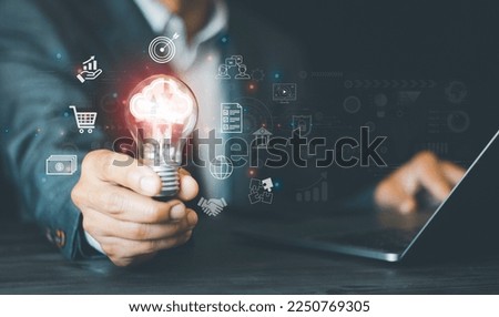Businessesman Hand holding a Light bulb Global Internet connection,Business global internet connection application technology and digital marketing, Financial and banking, Digital link tech, big data
