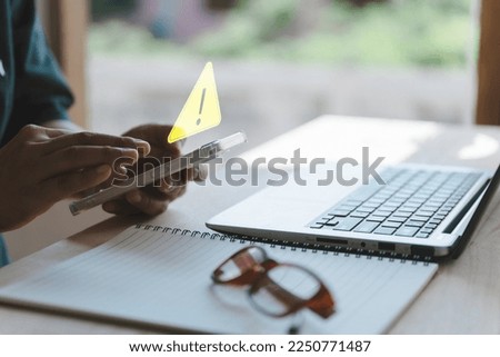 Caution Warning, error notification system and maintenance cyber attacks concept, computer networks Security data connection compromised Laptop computer user with warning triangle warn
