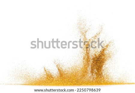 Explosion metallic gold glitter sparkle bokeh isolated white background decoration. Golden Glitter powder spark blink celebrate, blur foil part explode in air, fly throw gold glitters particle shape Royalty-Free Stock Photo #2250798639