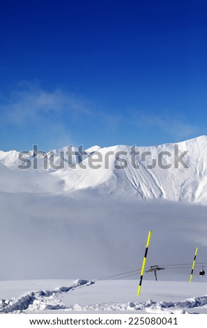 Snowy slope with new fallen snow. Caucasus Mountains, Georgia, ski resort Gudauri.