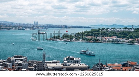 View from the roof of the Bosphorus Strait with ships. Summer panoramic landscape in Istanbul, Turkey.