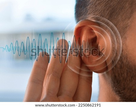 person having hearing issues concept. hearing loss concept. Royalty-Free Stock Photo #2250862191
