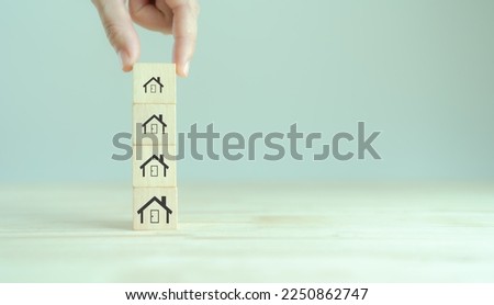 Downsizing home, houses concept. Downsizing property due to retirement or budget. Finding a tiny house or apartment. Moving to a smaller property for retirement time.  Increasing cash flow. Royalty-Free Stock Photo #2250862747