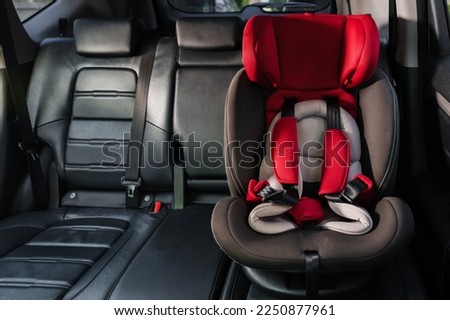 empty safety seat for baby or child in a car Royalty-Free Stock Photo #2250877961