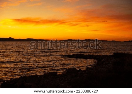 Sunset over the sea bay in Croatia