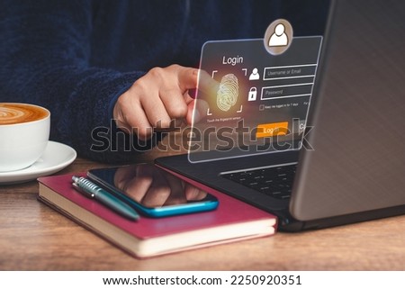 Access the system with a fingerprint on the virtual screen. A page for the login interface on the touch screen. Cyber security and personal data protection concept