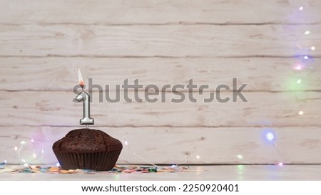 Festive card Happy Birthday with number of burning candles. Beautiful background copy space, happy birthday with digit number 1 
