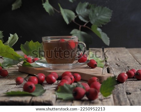 The concept of harvesting jam from healthy sea buckthorn for future use.Glass jars with jam on a wooden background.Autumn. Royalty-Free Stock Photo #2250952213
