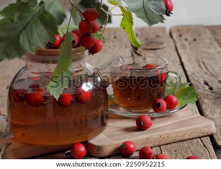 The concept of harvesting jam from healthy sea buckthorn for future use.Glass jars with jam on a wooden background.Autumn. Royalty-Free Stock Photo #2250952215