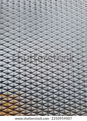 Close up photo steel grating zigzag pattern iron grating mesh background image