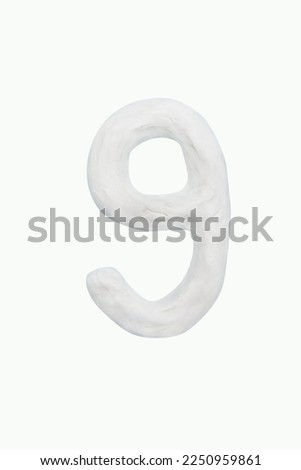 Plasticine handmade color white arabic number Nine. Isolated on white background. it is a universal language used all over world. For kids, children math operation to enhance brain skills.