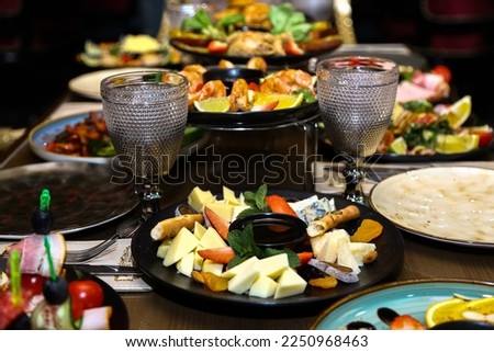 restaurant table with seafood and wine
