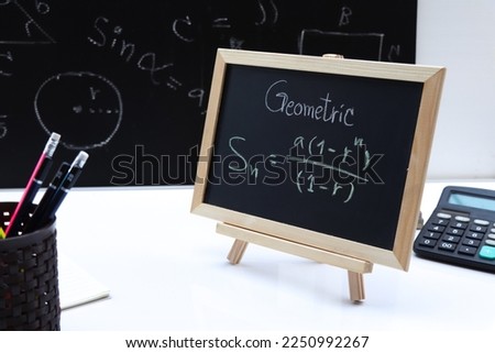 Blackboard with hand written Sequences and Series Formulas and geometric shapes and figures