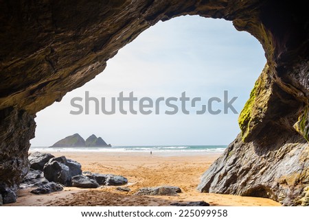 Large cave on the golden sandy beach at Holywell Bay Cornwall England UK Europe Royalty-Free Stock Photo #225099958