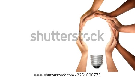 Symbols and shapes of light bulbs created by hand. People thinking together and team ideas coming together joining hands. The concept of idea, cooperation, teamwork and creative solution. Royalty-Free Stock Photo #2251000773
