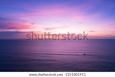 Aerial view sunset sky, Nature beautiful Light Sunset or sunrise over sea, Colorful dramatic majestic scenery Sky with Amazing clouds and waves in sunset sky purple light cloud background Royalty-Free Stock Photo #2251001911