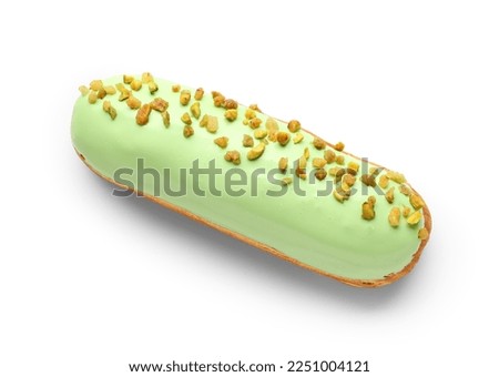 Delicious pistachio eclair isolated on white background Royalty-Free Stock Photo #2251004121