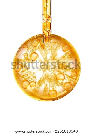 drop of serum oil, essential oil Royalty-Free Stock Photo #2251019543