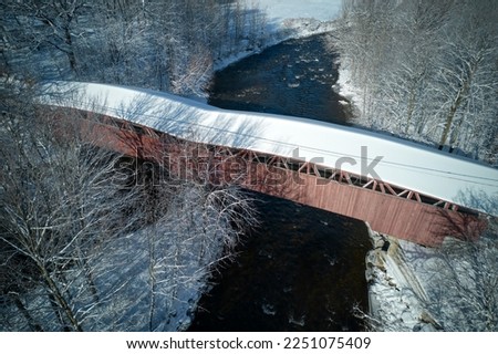 Beautiful cover bridge in Quebec canada during winter