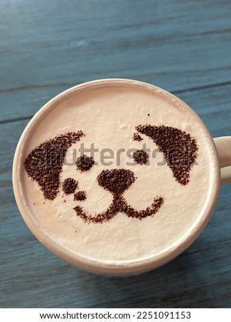 Dog cartoon on milk foam (Mocha drink)