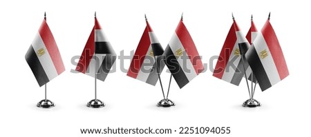 Small national flags of the white on a black background.