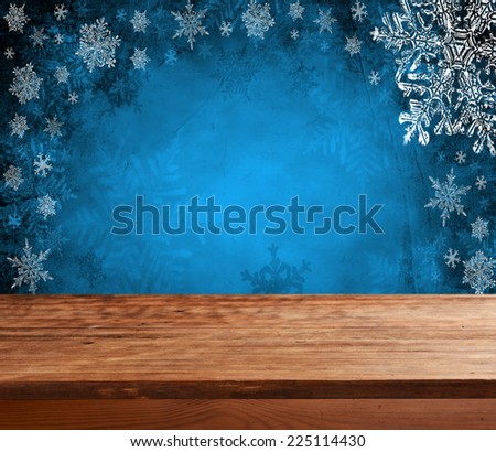 Empty wooden deck table with christmas background. Ready for product display montage.