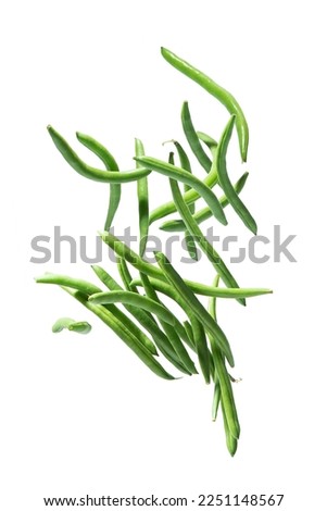 Young green beans falling on a white background Royalty-Free Stock Photo #2251148567