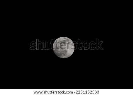 a picture of the full moon on a dark night