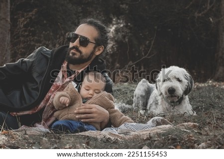 New born fall family photo shoot in forest with cool dad and dog