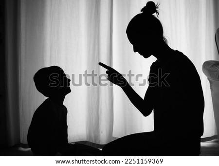 Mom parent disciplining her child.	 Royalty-Free Stock Photo #2251159369