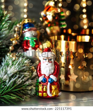 christmas decorations with golden shiny lights. festive arrangement. dark toned picture