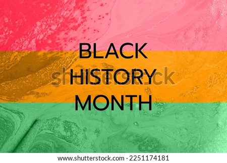 Liquid texture,colored in red,orange and green colors.Symbol of black history month.
