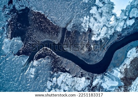 aerial view from icy river in winter Royalty-Free Stock Photo #2251183317