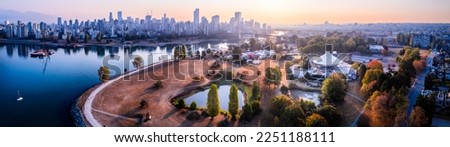 Downtown Vancouver sunrise aerial footage British Columbia, high rise apartment buildings, office tower, city center. 