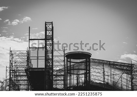 Low angle view of construction site against sky