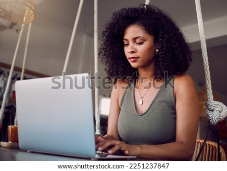 Laptop, study and student or black woman with eco friendly research, website information and online typing for online course. sustainability chair, desk and college girl on pc for internet blog post Royalty-Free Stock Photo #2251237847