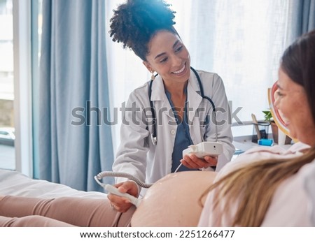 Woman, pregnancy and doctor, ultrasound at clinic with happiness, excited and family planning for future. Black woman medic, pregnant woman and consulting with medical tech on stomach for sonogram Royalty-Free Stock Photo #2251266477