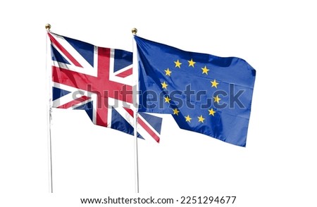 Union Jack and European Union flags on cloudy sky. waving in the sky