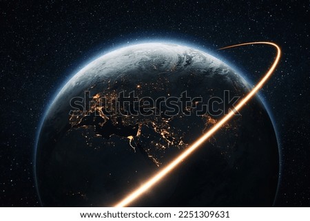 Space shuttle rocket flies with blasts and a light line around the night planet Earth with lights cities. Travel in space, concept. Space satellite flies near the planet earth. Starry space Royalty-Free Stock Photo #2251309631